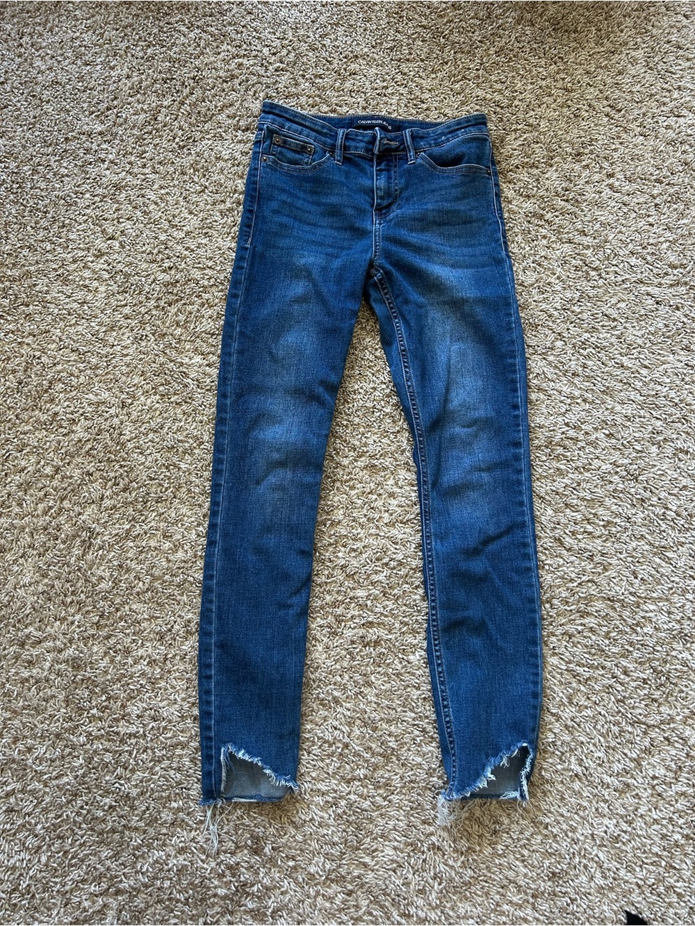 Calvin Klein Jeans Women’s Mid-Blue Skinny Jeans with Frayed Hems